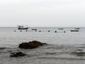 Scenery view in Ban Krut, Prachuap Khiri Khan with beach, sea, sky, and fishing boat Royalty Free Stock Photo