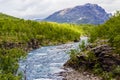 Scenery view in the Swedish north. Mountains river,