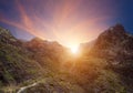 Scenery volcanic ravine landscape with sunset sky