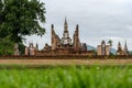 The scenery of Wat Mahathat temple on a cloudy day in the rainy season at Sukhothai province, Thailand Royalty Free Stock Photo