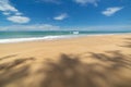 Scenery white cloud in blue sky above long white beach.