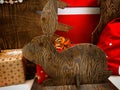 Scenery. Wooden hare among gift boxes