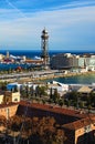 Scenic aerial landscape view of harbor in Barcelona. Funicular tower at port. View from Montjuic to the harbor Royalty Free Stock Photo