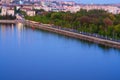 Scenic aerial landscape view of Ternopil. Motorway between city lake and park with green trees.