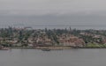 Scenic aerial panoramic Coronado Peninsula and San Diego Bay vista on a heavily overcast day, California Royalty Free Stock Photo