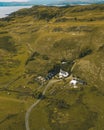 Scenic aerial shot of a farmhouse with beautiful natural surroundings in the Glencoe