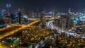 Scenic aerial view of a big modern city at night timelapse. Business bay, Dubai, United Arab Emirates. Royalty Free Stock Photo