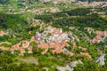 Scenic aerial view of the center of the touristic old town with houses and towers surrounded by green trees in Sintra, Portugal Royalty Free Stock Photo