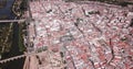 Scenic aerial view of Spanish city of Merida with ancient Roman Bridge and modern Lusitania Bridge over Guadiana river