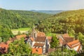 Scenic ancient monastery of Bebenhausen surrounded by forest in Southern Germany on a sunny evening Royalty Free Stock Photo