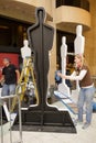 Scenic artists paint Oscar statues prior to the Academy Awards