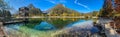 Scenic autumn forest at Crystal Lake in the Julian Alps Royalty Free Stock Photo