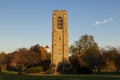 Scenic autumn image of the Joseph D. Baker Tower and Carillon at sunset located in Baker Park, Frederick.