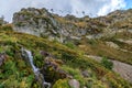 Scenic autumn landscape of Aibga ridge and Medvezhiy waterfall in Gorky Gorod mountain resort in Sochi, West Caucasus, Russia. Peo Royalty Free Stock Photo