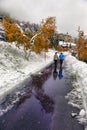 Scenic autumn view with the first snow, trees and forest in the