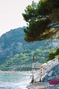 Scenic beach on a hot sunny day in Alassio, Italy