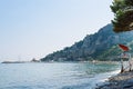 Scenic beach on a hot sunny day in Alassio, Italy