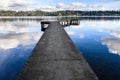 Scenic Bellevue skyline from a concrete dock in Luther Burbank Park on Mercer Island, WA, and a peaceful day on Lake Washington