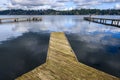 Scenic Bellevue skyline from a wooden dock in Luther Burbank Park on Mercer Island, WA, and a peaceful day on Lake Washington