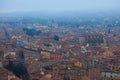 Scenic bird-eye view from the top of the tower on Bologna old town center. Vintage buildings with red tile roofs Royalty Free Stock Photo