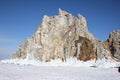 Scenic blue clear transparent ice Lake Baikal. Smooth surface deep cracks. Tourists people walk travel. Cinematic High mountains Royalty Free Stock Photo