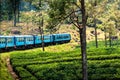 Scenic blue train through Sri Lanka highlands
