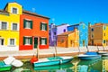 Scenic canal in Burano island, Venice, Italy