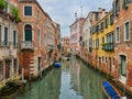 Scenic canal with gondola, Venice, Italy Royalty Free Stock Photo