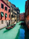 Scenic canal with gondola, Venice, Italy Royalty Free Stock Photo