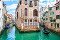 Scenic canal with old architecture in Venice, Italy