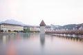 Scenic city and historic city center view of Lucerne with famous Chapel Bridge and lake Lucerne