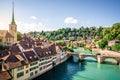 Scenic cityscape of Bern at sunset with untertorbrucke bridge over Aare river and Nydegg church view with dramatic light in Bern Royalty Free Stock Photo