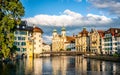 Scenic cityscape of Lucerne old town at sunset with Reussbrucke bridge and Jesuit Church and Reuss river Lucerne Switzerland Royalty Free Stock Photo