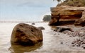 Scenic cliff with sundstone layers. the boulders on shore of Baltic sea. Summer storm time.