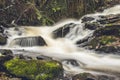 Scenic closeup view of the streamy waterfall in a French forest Royalty Free Stock Photo