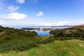Scenic coastal landscape surrounded by greenery in Drumbeg, Scotland Royalty Free Stock Photo