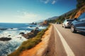 Scenic coastal road with moving cars, offering a fantastic seaside journey