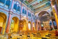 The scenic colorful interior of Basilica of St Antony of Padua with arcades on the side wall of Nave, on April 5 in Milan, Italy