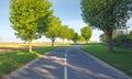 Scenic countryside road surrounded by trees in day . france Royalty Free Stock Photo