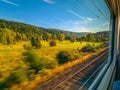 Scenic countryside view captured from a moving train window Royalty Free Stock Photo