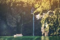 Scenic cruise approaches waterfall, Milford Sound. Royalty Free Stock Photo