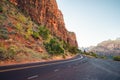 Scenic curved red rock asphalt road in Zion National Park Royalty Free Stock Photo