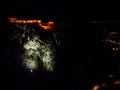 Illuminated Lake Bled castle on the rock at night scenic wide view Royalty Free Stock Photo