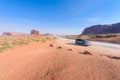 Scenic Drive on Dirt Road through Monument Valley, The famous Buttes of Navajo tribal Park, Utah - Arizona, USA. Scenic road and Royalty Free Stock Photo