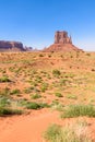 Scenic Drive on Dirt Road through Monument Valley, The famous Buttes of Navajo tribal Park, Utah - Arizona, USA. Scenic road and Royalty Free Stock Photo
