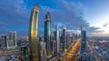 Scenic Dubai downtown architecture day to night timelapse. Top view over Sheikh Zayed road with illuminated skyscrapers Royalty Free Stock Photo