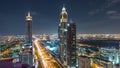 Scenic Dubai downtown architecture night timelapse. Top view over Sheikh Zayed road with illuminated skyscrapers and Royalty Free Stock Photo