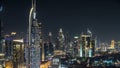 Scenic Dubai downtown skyline timelapse at night. Rooftop view of Sheikh Zayed road with numerous illuminated towers. Royalty Free Stock Photo
