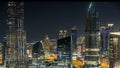 Scenic Dubai downtown skyline timelapse at night. Rooftop view of Sheikh Zayed road with numerous illuminated towers. Royalty Free Stock Photo