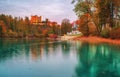 Scenic dusk view on illuminated Hohenschwangau castle reflected in Alpsee Lake, Bavaria, Germany at autumn evening